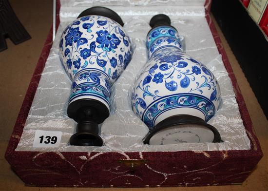 Two cased blue and white porcelain candle holders